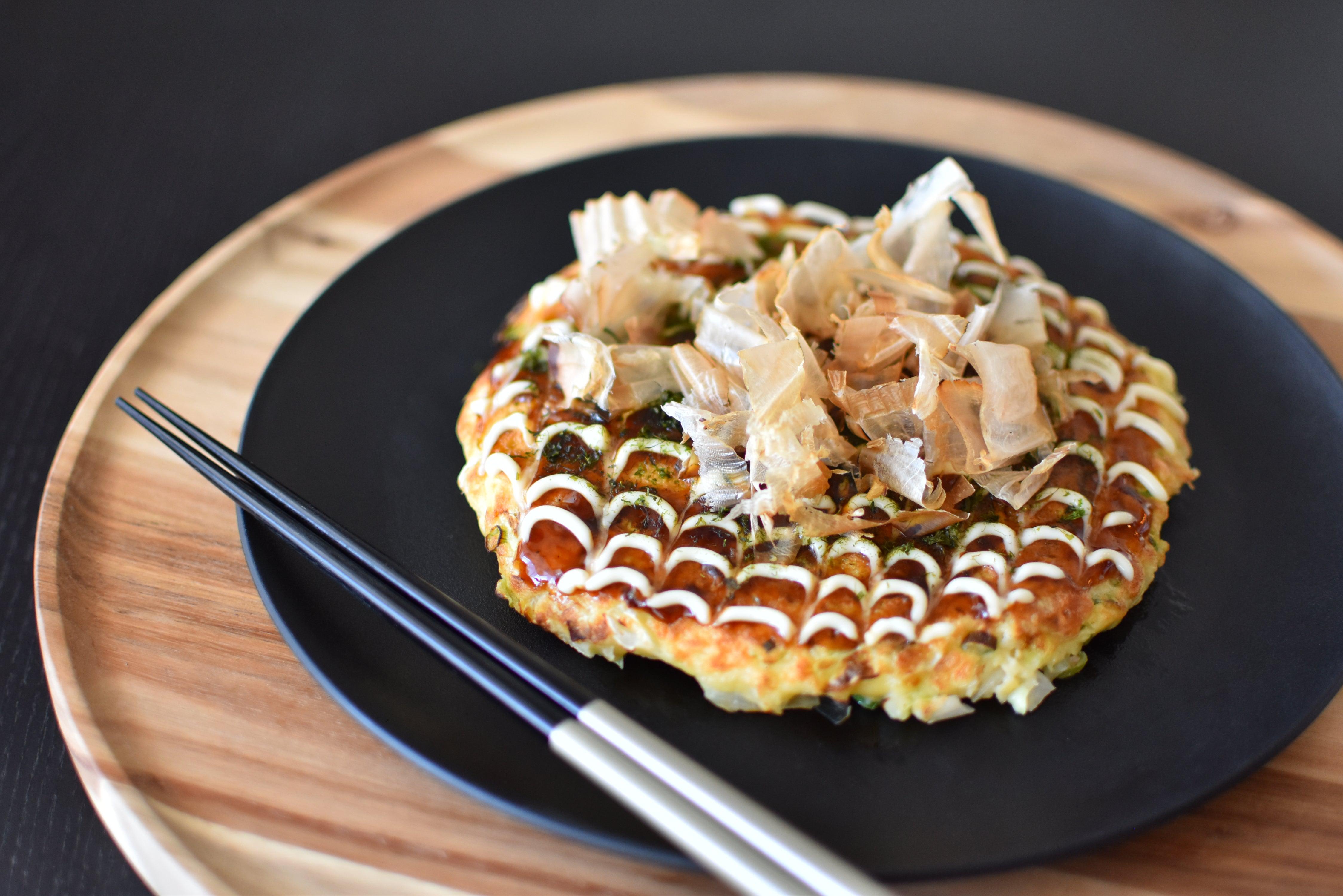 https://int.japanesetaste.com/cdn/shop/articles/how-to-make-osaka-style-okonomiyaki-at-home-japanese-savory-pancake-japanese-taste.jpg?v=1763541525&width=5760